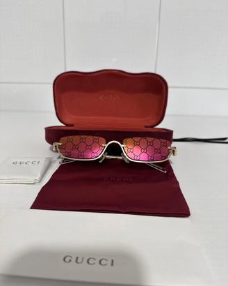 Occhiali da sole gucci con lenti a specchio rosa