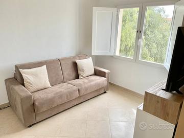 Bivano arredato con posto auto