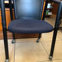 Tre poltroncine in pelle e tessuto nere