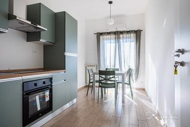 Stanze con cucina in comune