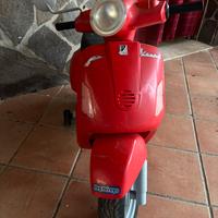 Vespa rossa Peg perego bimbi