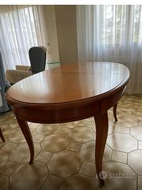 Tavolo in noce ovale allungabile