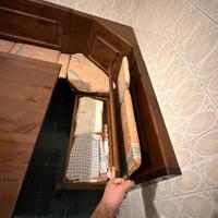 Tavolo in legno con panca contenitore angolare