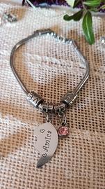 Bracciale con pendente a metà cuore inciso
