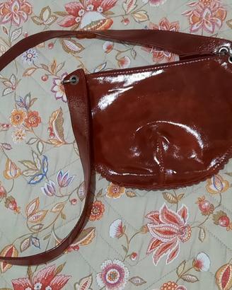 borsetta tracollina donna marca Coccinelle lucida