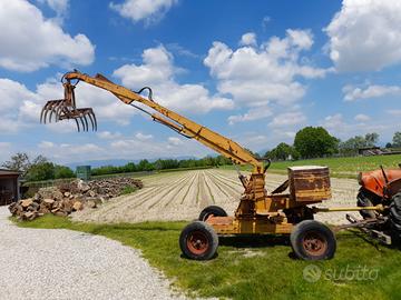 Caricatore di letame-Ragno