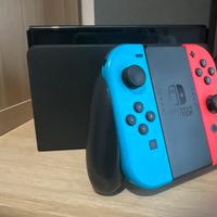 Nintendo Switch OLED + 3 giochi originali+custodia