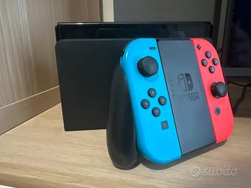 Nintendo Switch OLED + 3 giochi originali+custodia