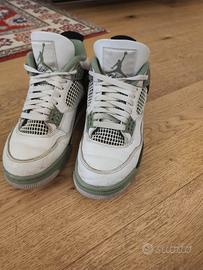 Jordan 4 Retro Seafoam verdi, nere e bianche 
