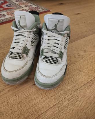 Jordan 4 Retro Seafoam verdi, nere e bianche 