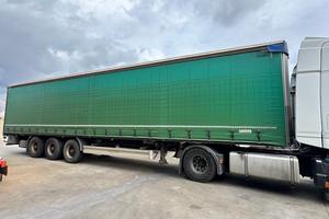 Semirimorchio Acerbi centinato rulliere