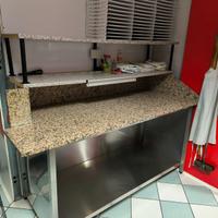 Banco in inox con piano in granito