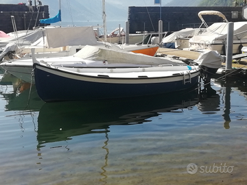 Gozzo vetroresina con fuoribordo