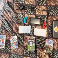 Nintendo switch + custodia + 4 giochi