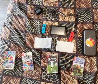 Nintendo switch + custodia + 4 giochi