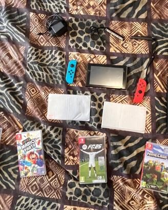 Nintendo switch + custodia + 4 giochi