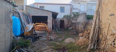 casa con terreno da ultimare 