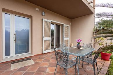 Elegante appartamento con giardino privato a Villa