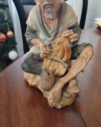 Statua anziano cinese porcellana