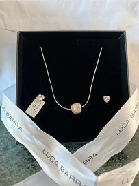 Orecchini a forma di cuore e Collana con perla