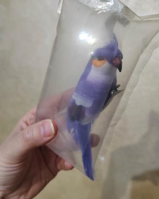 uccello artificiale viola 