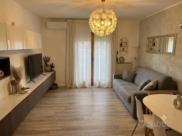 Appartamento su due piani con giardino