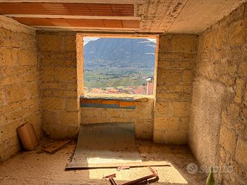 Mansarda allo stato rustico