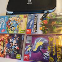 4 giochi Nintendo switch 1/ 2 + borsa viaggio 