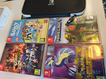 4 giochi Nintendo switch 1/ 2 + borsa viaggio 
