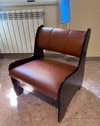 Poltrona di pelle e legno