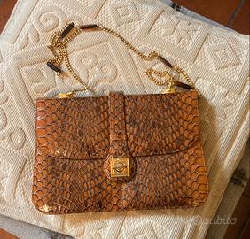 Borsa in pelle di serpente fatta a mano