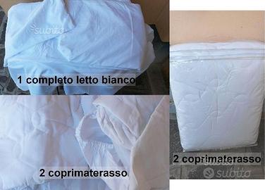 TESSILE CASA:piumini,teli,federe,tovaglie,coperte