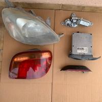 Fanali + centralina + motorino terg. Yaris 1ª ser