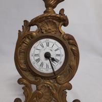 OROLOGIO DA TAVOLO D' EPOCA 800 IN BRONZO DORATO.