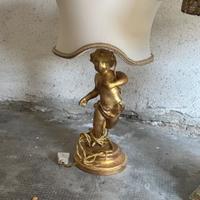 Lampada putto col bronzo