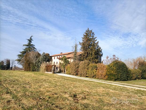 Casa colonica e terreno