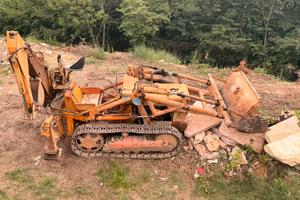 Ruspa cingolata Fiat FL4 con retroescavatore