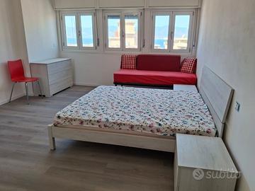 Centrale elegante attico con terrazzo vista mare