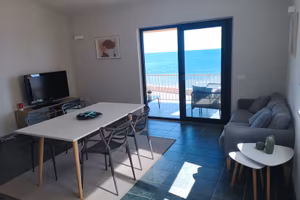 Casa con terrazza fronte mare