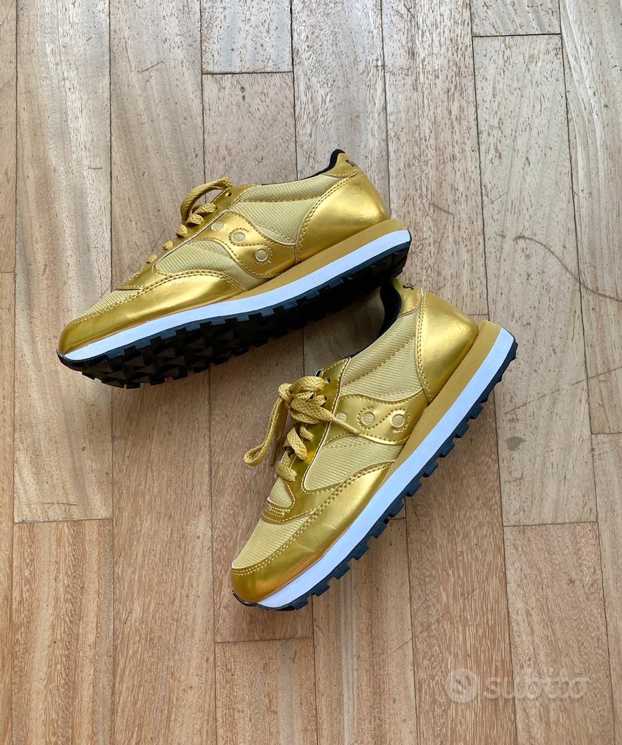 Saucony phoenix 8 bambino oro on sale