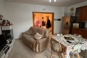 Appartamento con terrazzo posto auto e box