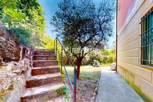 LUMINOSO TRILOCALE CON GIARDINO PRIVATO E CANTINA