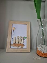 quadretto famiglia realizzato con sassolini 