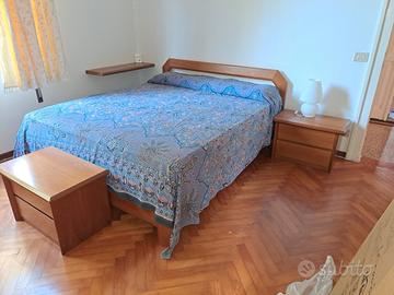 Camera da letto in legno massello