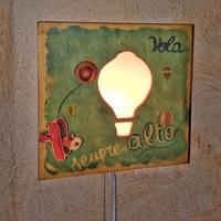 Carillon lampada in legno.