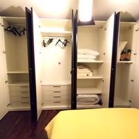 Armadio a 8 ante, Letto contenitore, Comodini