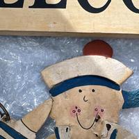 Decoro in legno e metallo