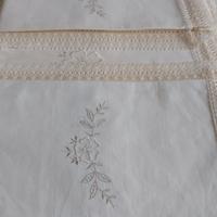 lenzuolo ricamato con pizzo