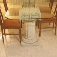 Tavolo in vetro  con colonne in pietra e 6 sedie