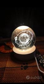 Lampada a led in sfera vetro base in legno
saturno